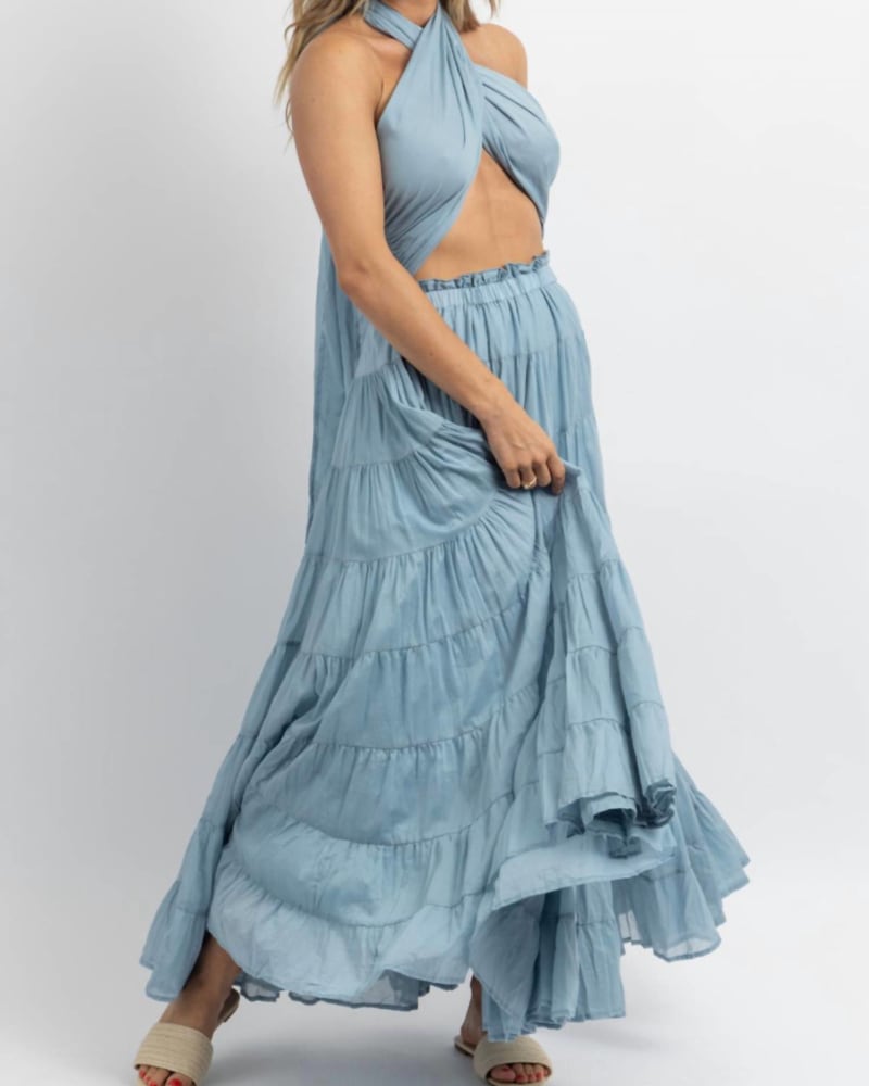 Front of a model wearing a size L Crossover Tie Tiered Maxi Dress In Azul in Azul by MABLE. | dia_product_style_image_id:350555